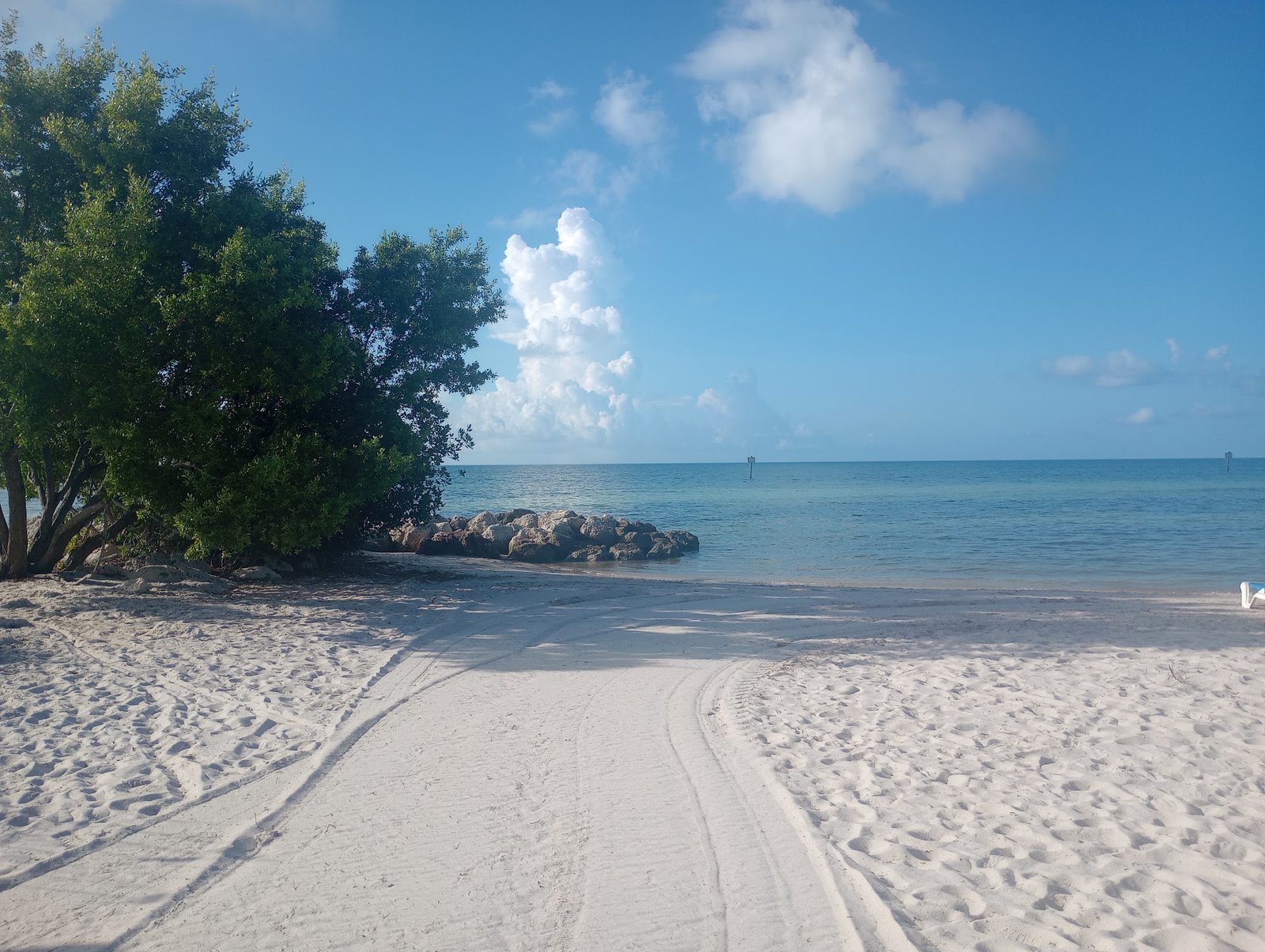 White sand beach and turquoise water in Key West under a blue sky